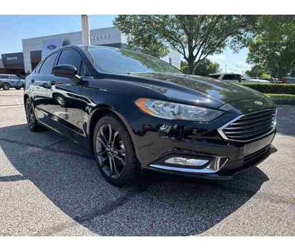 2018 Ford Fusion SE is a Black 2018 Ford Fusion SE Car for Sale in Collierville TN