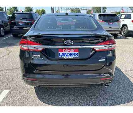 2018 Ford Fusion SE is a Black 2018 Ford Fusion SE Car for Sale in Collierville TN