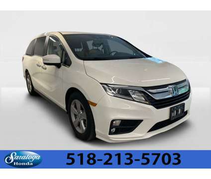 2019 Honda Odyssey EX-L is a White 2019 Honda Odyssey EX Car for Sale in Saratoga Springs NY