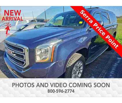 2017 GMC Yukon XL SLT is a Blue 2017 GMC Yukon XL SLT Car for Sale in Traverse City MI