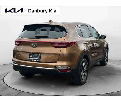 2021UsedKiaUsedSportageUsedAWD is a Gold 2021 Kia Sportage Car for Sale in Danbury CT