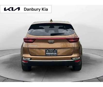 2021UsedKiaUsedSportageUsedAWD is a Gold 2021 Kia Sportage Car for Sale in Danbury CT