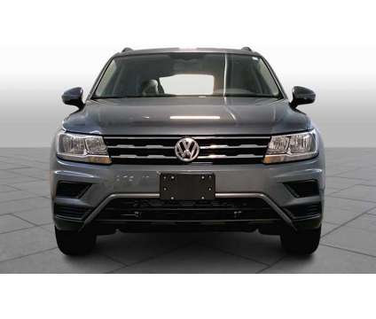 2021UsedVolkswagenUsedTiguan is a Grey, Silver 2021 Volkswagen Tiguan Car for Sale in Merriam KS