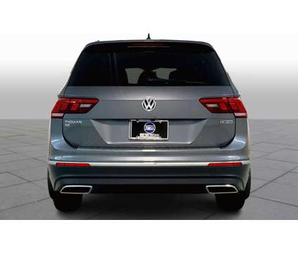 2021UsedVolkswagenUsedTiguan is a Grey, Silver 2021 Volkswagen Tiguan Car for Sale in Merriam KS