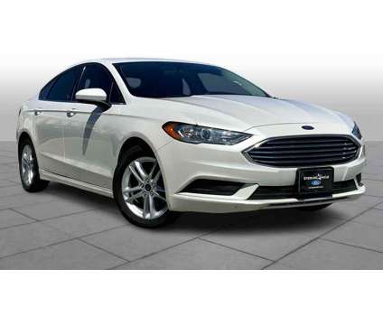 2018UsedFordUsedFusion is a Silver, White 2018 Ford Fusion Car for Sale in Houston TX
