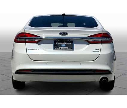 2018UsedFordUsedFusion is a Silver, White 2018 Ford Fusion Car for Sale in Houston TX