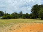 Gadsden,77 acre +/- in North with 288 +/- road frontage on