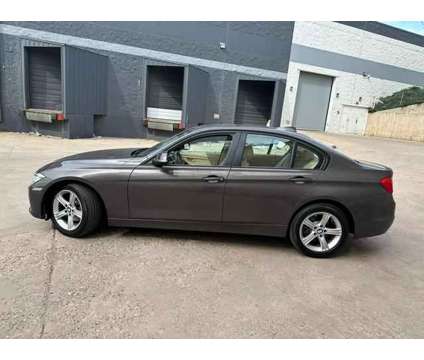2014 BMW 3 Series for sale is a Brown 2014 BMW 3-Series Car for Sale in Englewood CO
