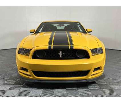 2013 Ford Mustang Boss 302 is a Yellow 2013 Ford Mustang Boss 302 Coupe in Issaquah WA