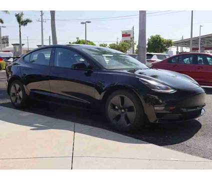 2022 Tesla Model 3 Base is a Black 2022 Tesla Model 3 Sedan in Fort Myers FL
