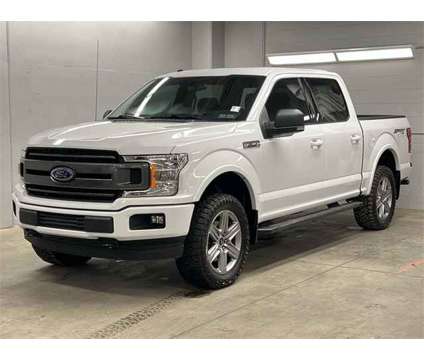 2018 Ford F-150 XLT is a White 2018 Ford F-150 XLT Truck in Zelienople PA