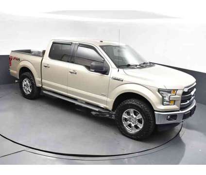 2017 Ford F-150 XLT is a Gold, White 2017 Ford F-150 XLT Truck in Jackson MS