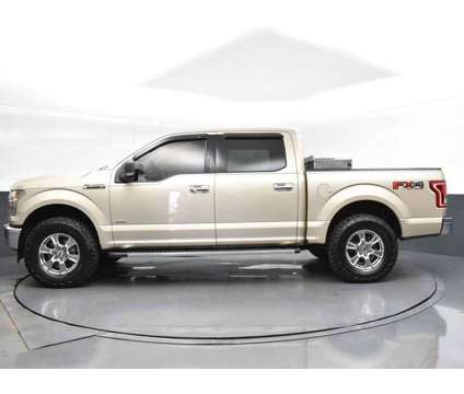 2017 Ford F-150 XLT is a Gold, White 2017 Ford F-150 XLT Truck in Jackson MS