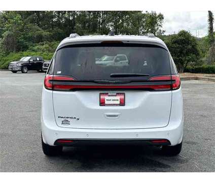 2024 Chrysler Pacifica Touring L is a White 2024 Chrysler Pacifica Touring Car for Sale in Canton GA