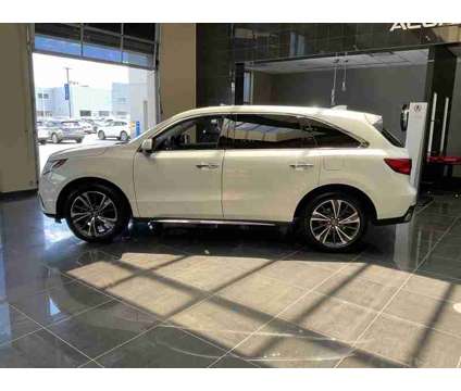 2020 Acura MDX Technology SH-AWD is a Silver, White 2020 Acura MDX Technology SUV in Kansas City MO