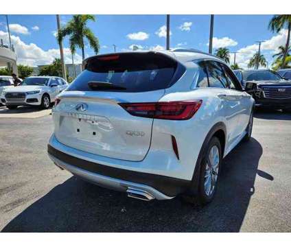 2024 Infiniti Qx50 Luxe is a White 2024 Infiniti QX50 Luxe SUV in Fort Lauderdale FL