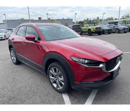 2023 Mazda CX-30 2.5 S Premium Package is a Red 2023 Mazda CX-3 SUV in Littleton CO