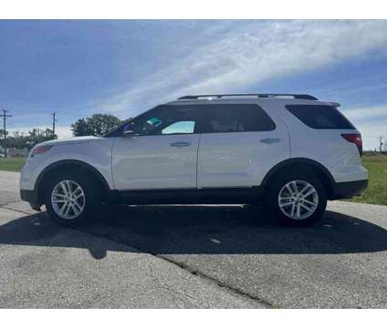 2015 Ford Explorer XLT is a Silver, White 2015 Ford Explorer XLT SUV in Fort Dodge IA