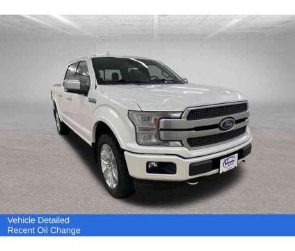 2018 Ford F-150 Platinum is a Silver, White 2018 Ford F-150 Platinum Truck in Ottumwa IA