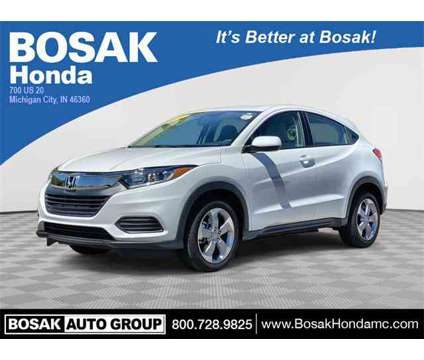 2022 Honda HR-V LX is a Silver, White 2022 Honda HR-V LX SUV in Michigan City IN