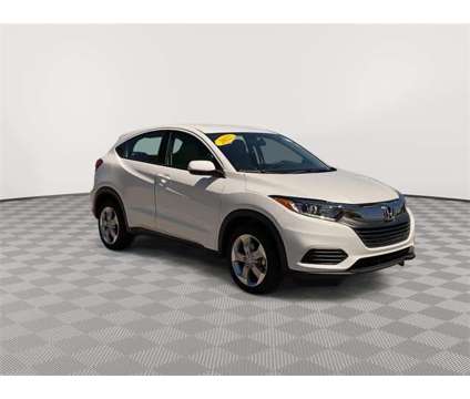 2022 Honda HR-V LX is a Silver, White 2022 Honda HR-V LX SUV in Michigan City IN