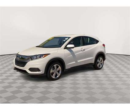 2022 Honda HR-V LX is a Silver, White 2022 Honda HR-V LX SUV in Michigan City IN