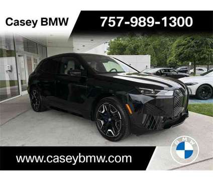 2025 BMW iX xDrive50 is a Black 2025 BMW 325 Model iX SUV in Newport News VA