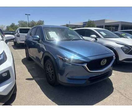 2020 Mazda CX-5 Sport is a Blue 2020 Mazda CX-5 Sport SUV in Tucson AZ