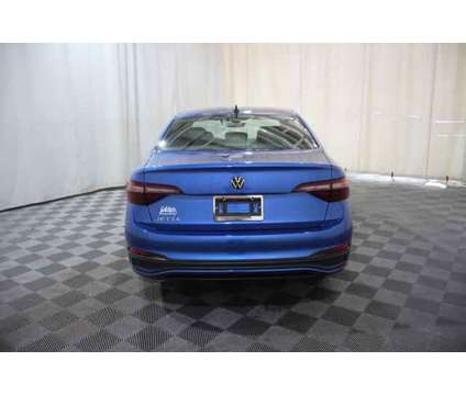 2024 Volkswagen Jetta 1.5T Sport is a Blue 2024 Volkswagen Jetta 2.5 Trim Sedan in Wichita KS