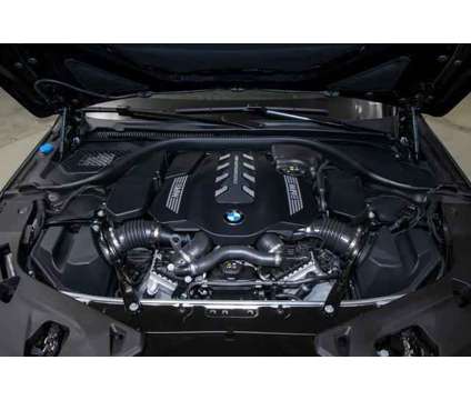 2025 BMW 8 Series xDrive is a Black 2025 BMW 8-Series Coupe in Lake Bluff IL