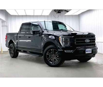 2021 Ford F-150 LARIAT is a Black 2021 Ford F-150 Lariat Truck in Madison WI