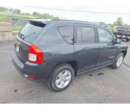 2014 Jeep Compass Sport is a 2014 Jeep Compass Sport SUV in Dubuque IA
