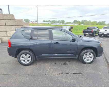 2014 Jeep Compass Sport is a 2014 Jeep Compass Sport SUV in Dubuque IA