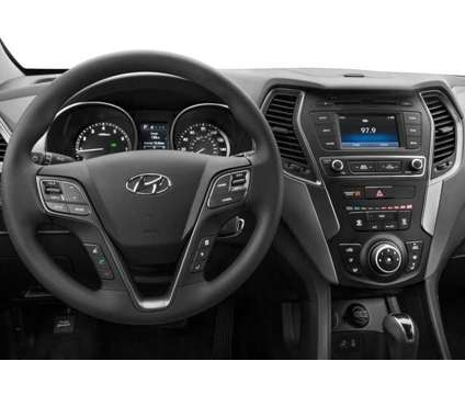 2017 Hyundai Santa Fe Sport 2.4L is a Gold 2017 Hyundai Santa Fe Sport 2.4L SUV in Pittsburgh PA