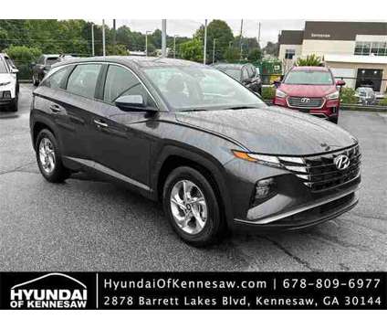 2024 Hyundai Tucson SE is a Grey 2024 Hyundai Tucson SE SUV in Kennesaw GA