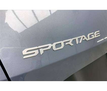 2023 Kia Sportage EX is a Silver 2023 Kia Sportage EX SUV in Madison WI