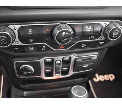 2019 Jeep Wrangler Unlimited Sahara is a White 2019 Jeep Wrangler Unlimited Sahara SUV in Dubuque IA