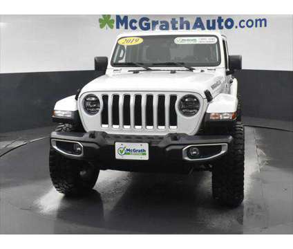 2019 Jeep Wrangler Unlimited Sahara is a White 2019 Jeep Wrangler Unlimited Sahara SUV in Dubuque IA