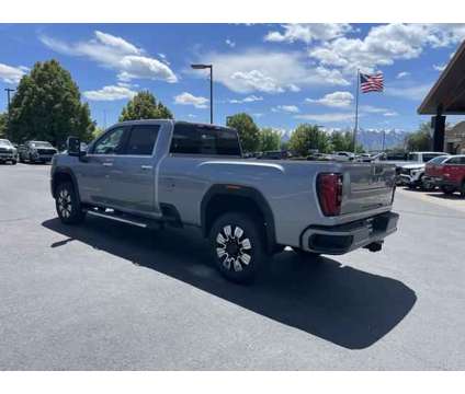 2024 GMC Sierra 3500HD 4WD Crew Cab Long Bed Denali is a Silver 2024 GMC Sierra 3500 H/D Truck in Logan UT