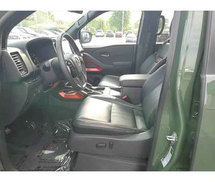 2023 Nissan Frontier Crew Cab PRO-4X 4x4 is a Green 2023 Nissan frontier Truck in Elmhurst IL