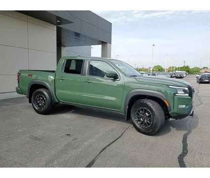 2023 Nissan Frontier Crew Cab PRO-4X 4x4 is a Green 2023 Nissan frontier Truck in Elmhurst IL