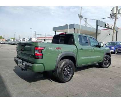 2023 Nissan Frontier Crew Cab PRO-4X 4x4 is a Green 2023 Nissan frontier Truck in Elmhurst IL