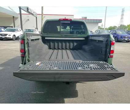 2023 Nissan Frontier Crew Cab PRO-4X 4x4 is a Green 2023 Nissan frontier Truck in Elmhurst IL