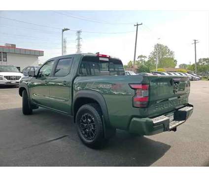 2023 Nissan Frontier Crew Cab PRO-4X 4x4 is a Green 2023 Nissan frontier Truck in Elmhurst IL