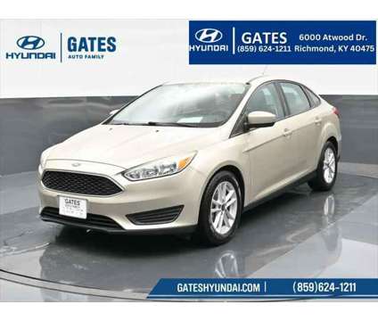 2018 Ford Focus SE is a Gold, White 2018 Ford Focus SE Sedan in Richmond KY