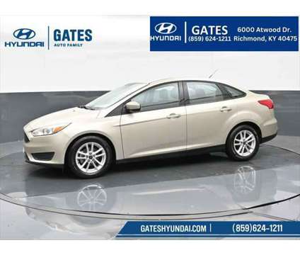 2018 Ford Focus SE is a Gold, White 2018 Ford Focus SE Sedan in Richmond KY