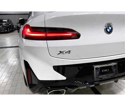 2024 BMW X4 xDrive30i is a White 2024 BMW X4 xDrive30i SUV in Grand Blanc MI