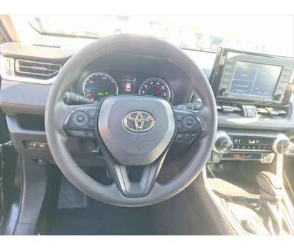 2021 Toyota RAV4 XLE Hybrid is a Black 2021 Toyota RAV4 XLE Hybrid in Dubuque IA