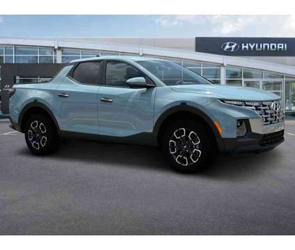 2024 Hyundai Santa Cruz SEL is a Blue 2024 Truck in Clermont FL