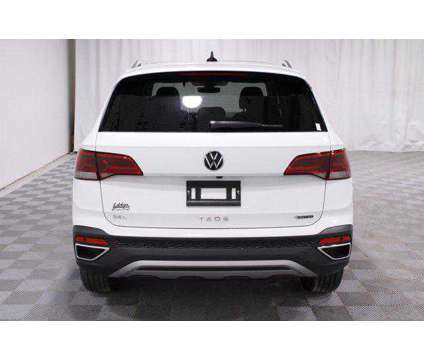 2024 Volkswagen Taos 1.5T SEL is a White 2024 SUV in Wichita KS